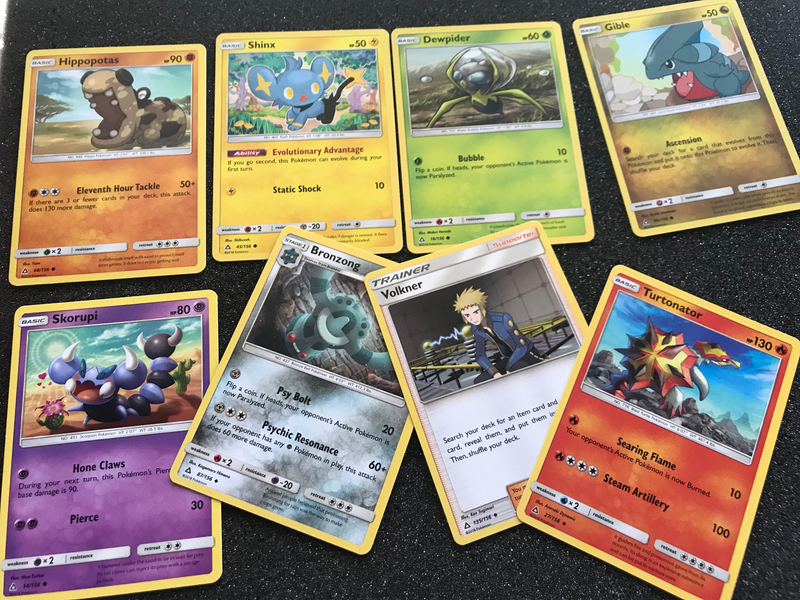 Illustration for article titled Let's Open Some Pokemon Ultra Prism Cards And See If There's Anything Good